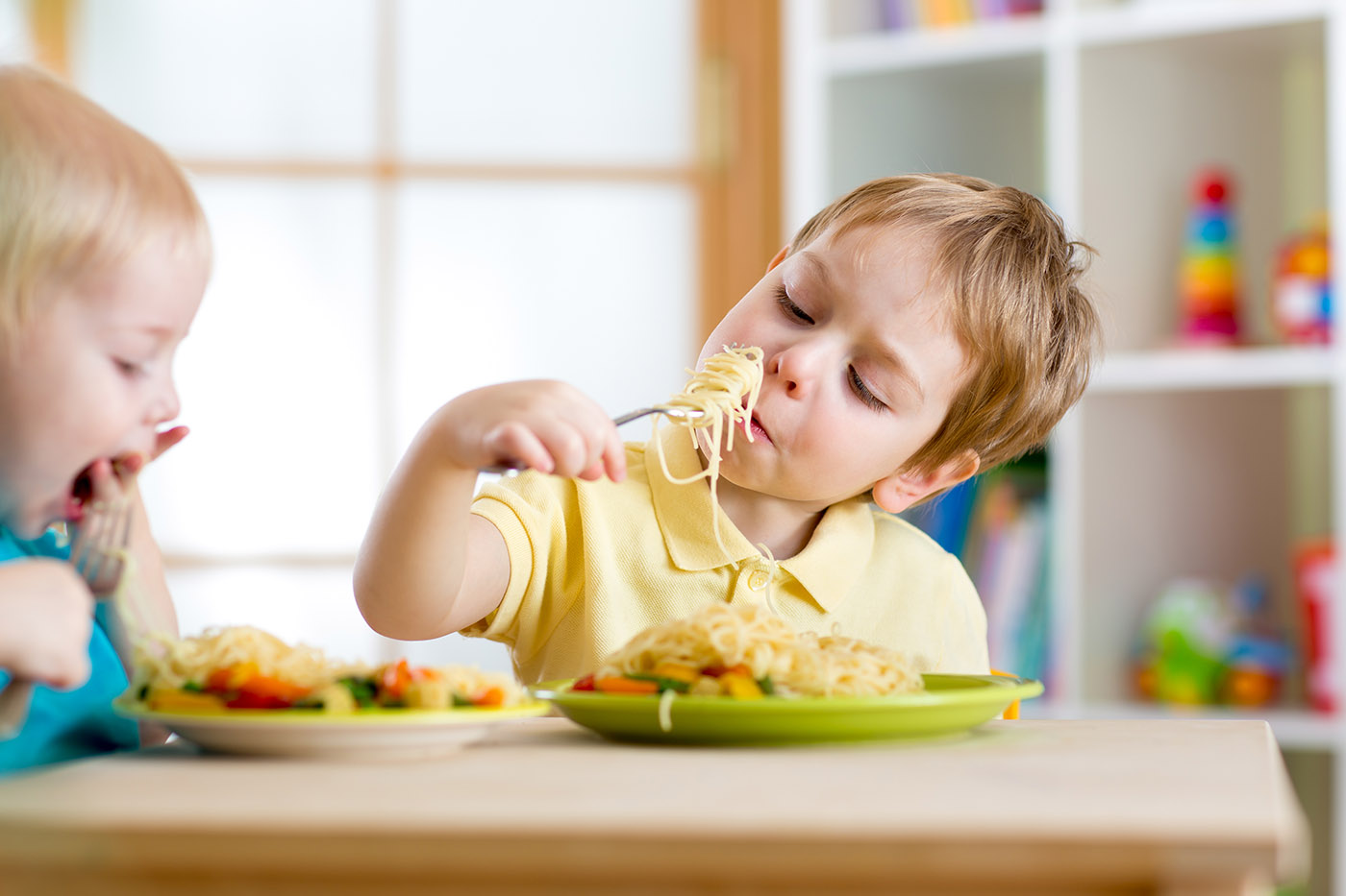 An Image of a Child Eating a Freshly Prepared Meal